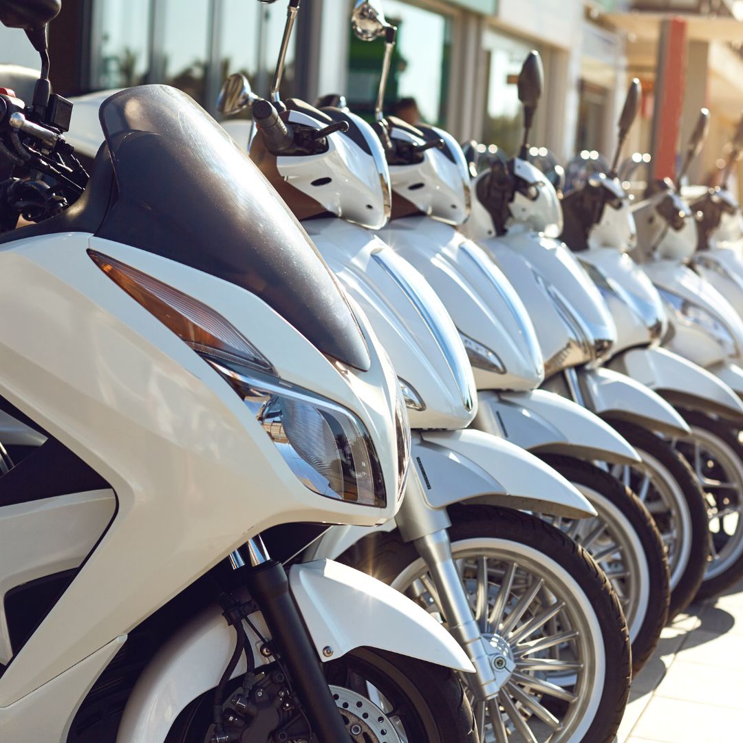 White scooters lined up.